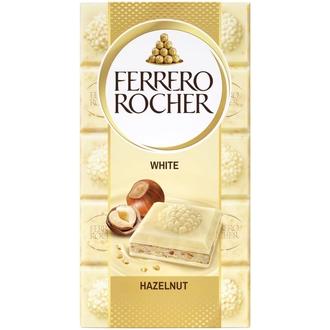 Ferrero Rocher White -valkosuklaalevy 90g. Täytettyä valkosuklaata (60%) hasselpähkinätäytteellä (37%) ja hasselpähkinän paloilla. kalorit ja ravintosisältö