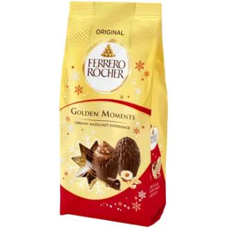 Ferrero Rocher Golden-suklaatäytemunia 90g. Maitosuklaata hasselpähkinä-kaakaotäytteellä (36,5 %), jossa hasselpähkinä- ja vehnärouhetta. kalorit ja ravintosisältö - 574 kcal
